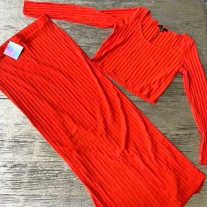 Brand New with tags. Two piece crop top skirt set.